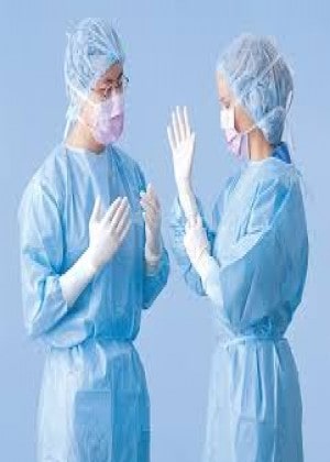 Sterile surgical gown with gloves